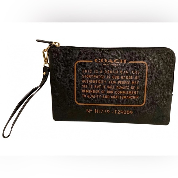 Coach black saffiano leather wristlet